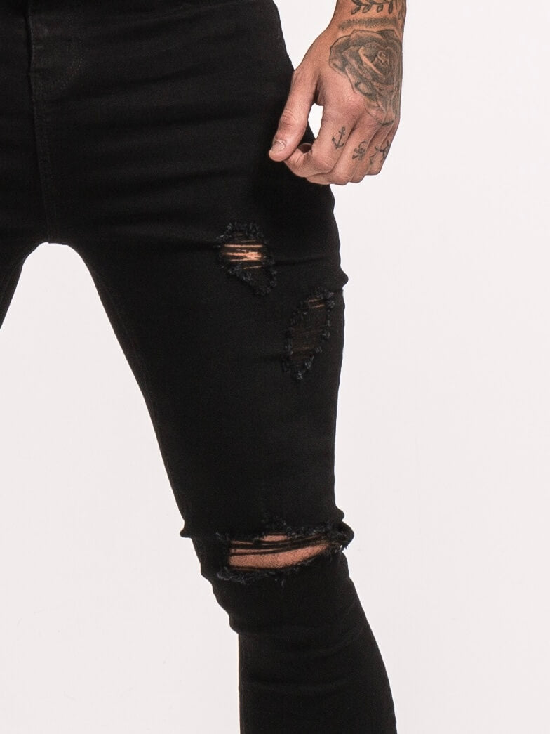 Jeans clasico negro rasgado